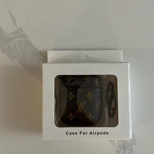 Brand new in box,not authentic Louis Vuitton air pod case.